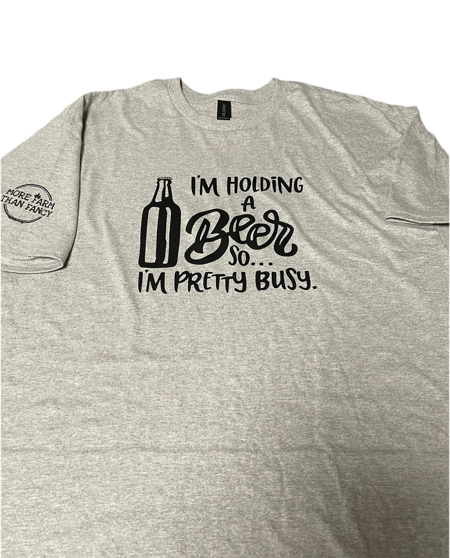 I’m holding a beer t shirt